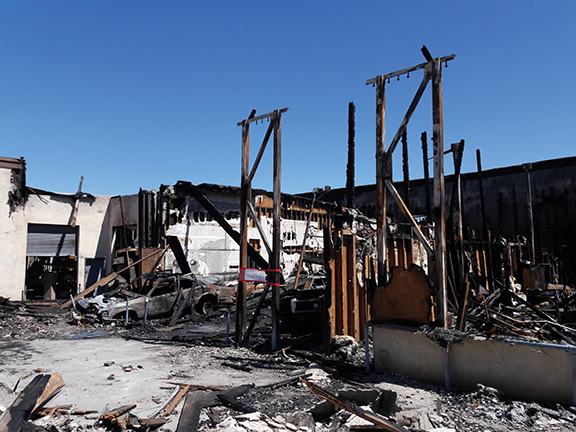 Only charred remains of auto  restoration shop  - Cover Image